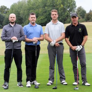 Harwood team tee off for charity